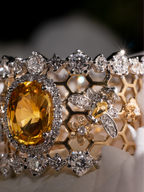 Honeycomb openwork ring with oval yellow sapphire center and pave stones