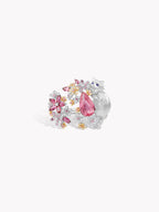 Silver-tone open ring with pink pear center stone, floral gems, cat motif
