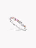 Layered crystal bracelet with pink gemstone accents and silver-tone links