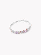 Silver-tone layered bracelet with round pink and clear stones, open cuff