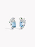 Aquamarine blue gemstone stud earrings with floral halo of clear stones, silver-tone