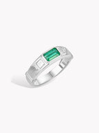 Men’s emerald ring with rectangular green gemstone on silver band