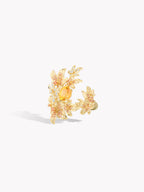 Maple leaf open ring with yellow center stones and gold-tone leaf clusters