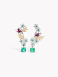 Floral drop earrings with emerald-green square stones, red accents, and gold-tone leaves