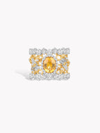 Honeycomb openwork ring with yellow oval gemstone and pavé silver-toned detailing