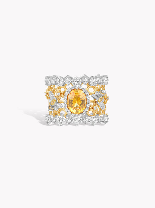 Honeycomb openwork ring with yellow oval gemstone and pavé silver-toned detailing