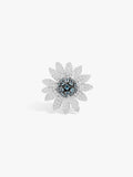 Sunflower-style ring with silver-toned pave petals and blue center stones