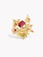 Gold-tone thorny branch ring, maroon square center with pink stones and green leaves
