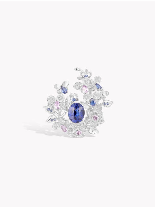 Rose garden ring, blue oval center with diamond petals and pink stones