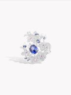 Rose garden ring, blue sapphire surrounded by diamond floral prongs