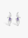 Crescent moon and star earrings with purple gemstone centers, silver-tone pavé, stud style