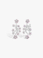 Branch blossom drop earrings with silver-tone branches and pink gemstone clusters.
