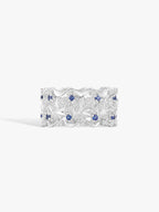 Swan wing ring with blue sapphire and clear diamond accents, silver-tone band
