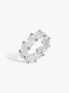 Swan wing ring close view, silver-tone gallery with blue sapphire clusters and diamond trim