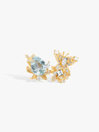Gold aquamarine butterfly ring with oval gemstone and diamond pavé wings