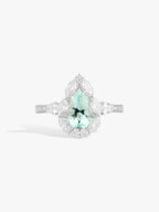 Teardrop beryl diamond pave ring with mint center stone and split shank