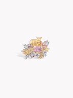 Gold deer garden ring side view, with purple center stone and multicolor floral clusters