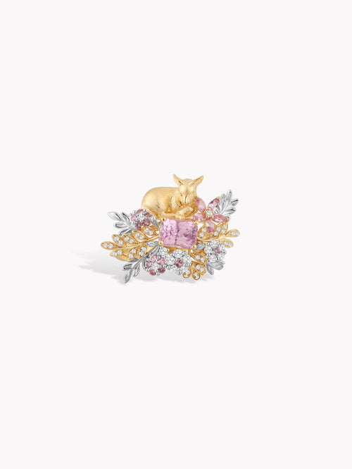 Gold deer garden ring side view, with purple center stone and multicolor floral clusters