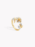 18k gold flower twist ring with pavé floral twist detail