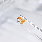 Rectangle yellow sapphire gemstone in silver prong setting