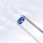 Rectangle octagonal sapphire in silver-tone prong setting, blue gemstone