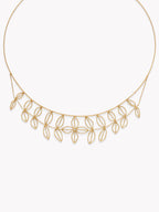 18k yellow gold leaf lace necklace detail with dangling leaf lace fringe along chain