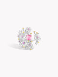 Floral branch ring with pink center stone, clear gems, and silver-tone flower setting