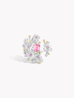 Floral branch ring with pink center stone and clear pavé accents