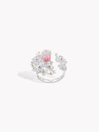 Floral branch ring with pink center stone and sparkling clear stones
