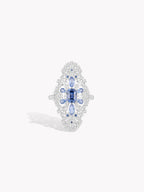 Sapphire blue floral hydrangea ring, pavé halo stones on a silver-toned band