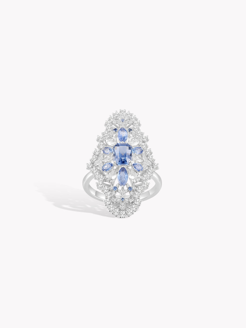 Hydrangea-style blue gemstone ring with three sapphire accents and clear halo