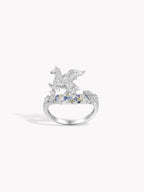 Silver pegasus ring with blue gemstones and decorative stones on the band