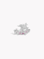 Silver-tone pegasus motif ring with clear stones and pink gemstone accents