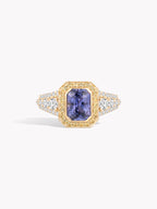 Gold-toned octagonal frame ring with purple sapphire center and diamond pavé band