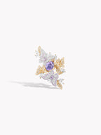 Butterfly ring with purple sapphire center, diamond-like pavé accents, gold tone band