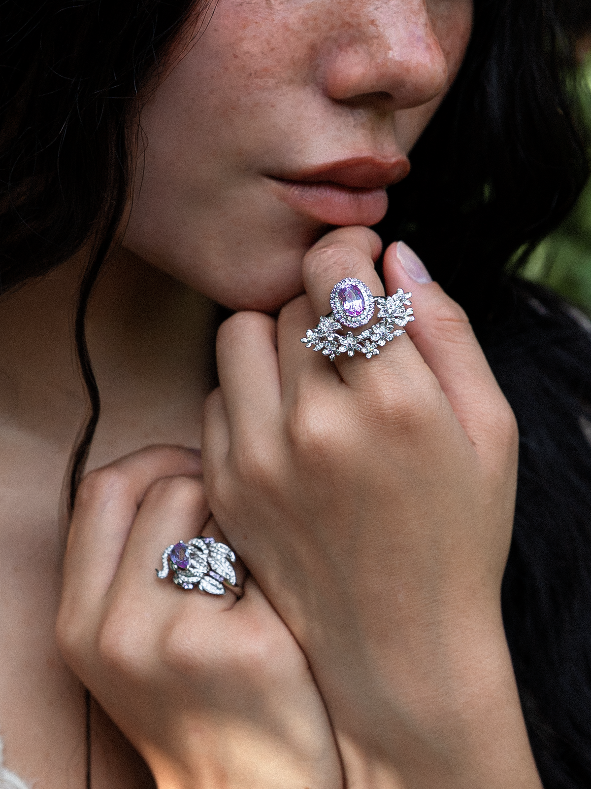 Silver stackable cherry blossom rings with pink center stones and floral side clusters