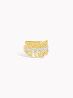 Gold ruffle diamond ear cuff with curved band and line of clear stones