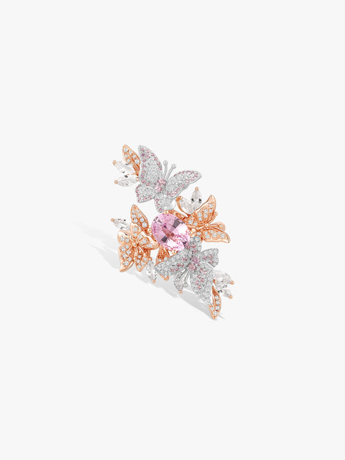 Butterfly gemstone ring with pink oval center, rose-gold band and pavé crystal wings