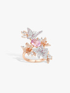 Butterfly wing gemstone ring with pink center stone and rose-gold and crystal accents