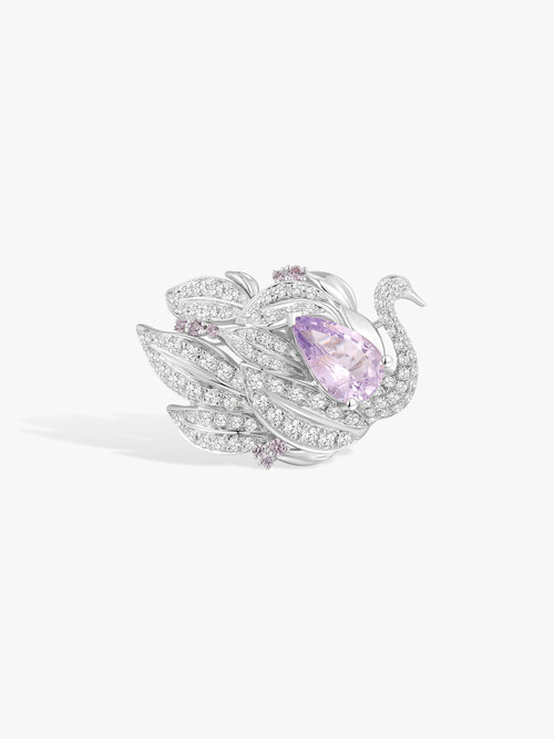 Swan Lake ring with purple oval spinel and diamond pavé swan setting