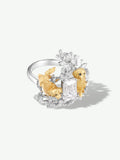 Diamond puppy and floral ring; silver setting with two gold-tone puppy figures