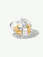 Diamond puppy and floral ring; silver setting with two gold-tone puppy figures