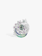 Cat-shaped silver ring with green center stone, colorful halo and green accent band