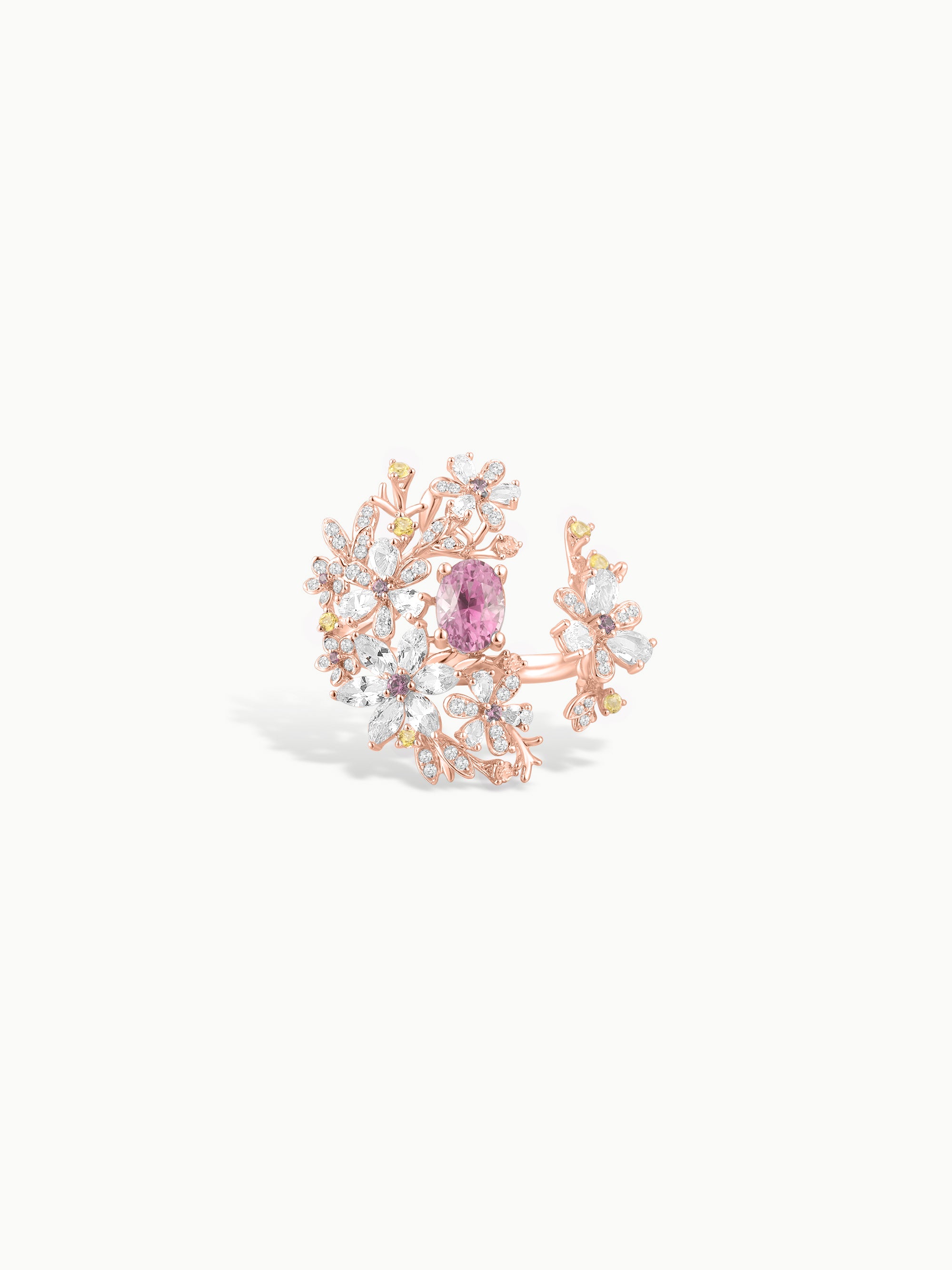 Floral branch ring in rose gold with pink center stone and clear floral accents