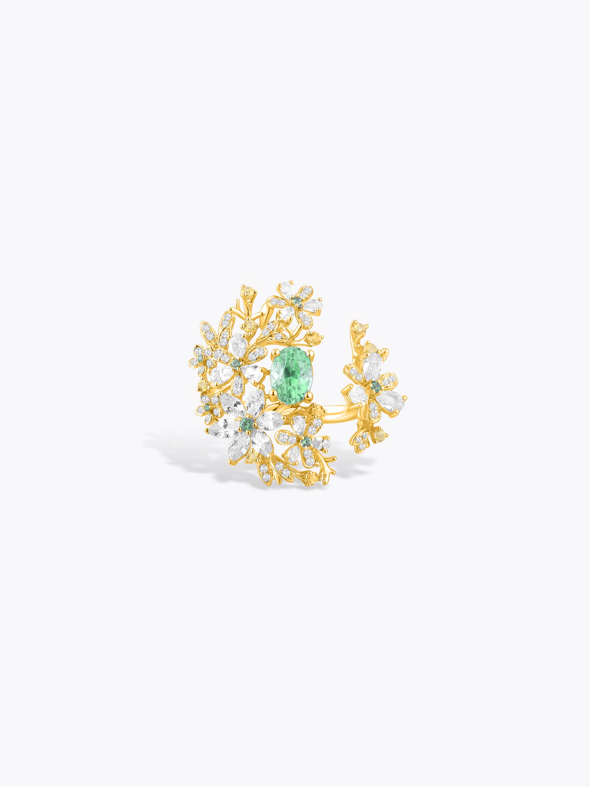 Floral branch ring in yellow gold with green center gemstone